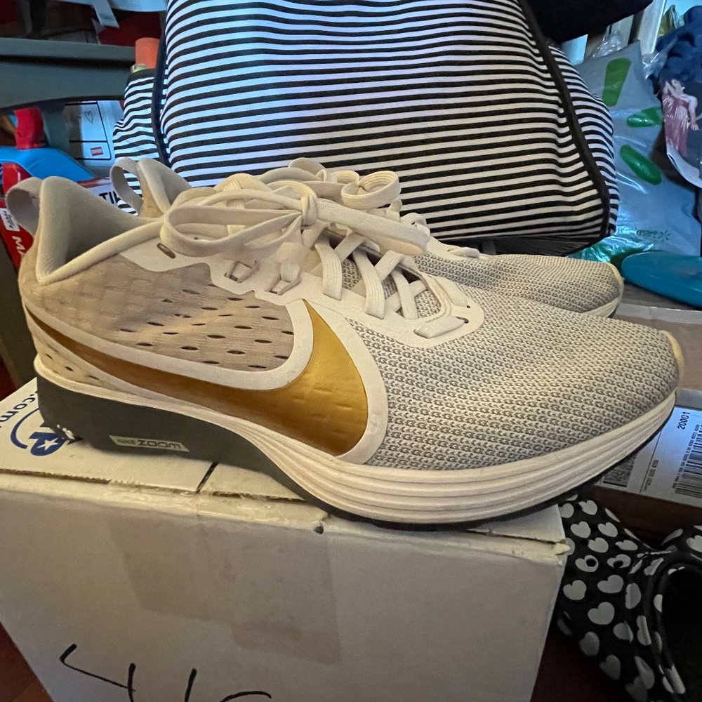 Nike Zoom white and gold running shoes 8.5